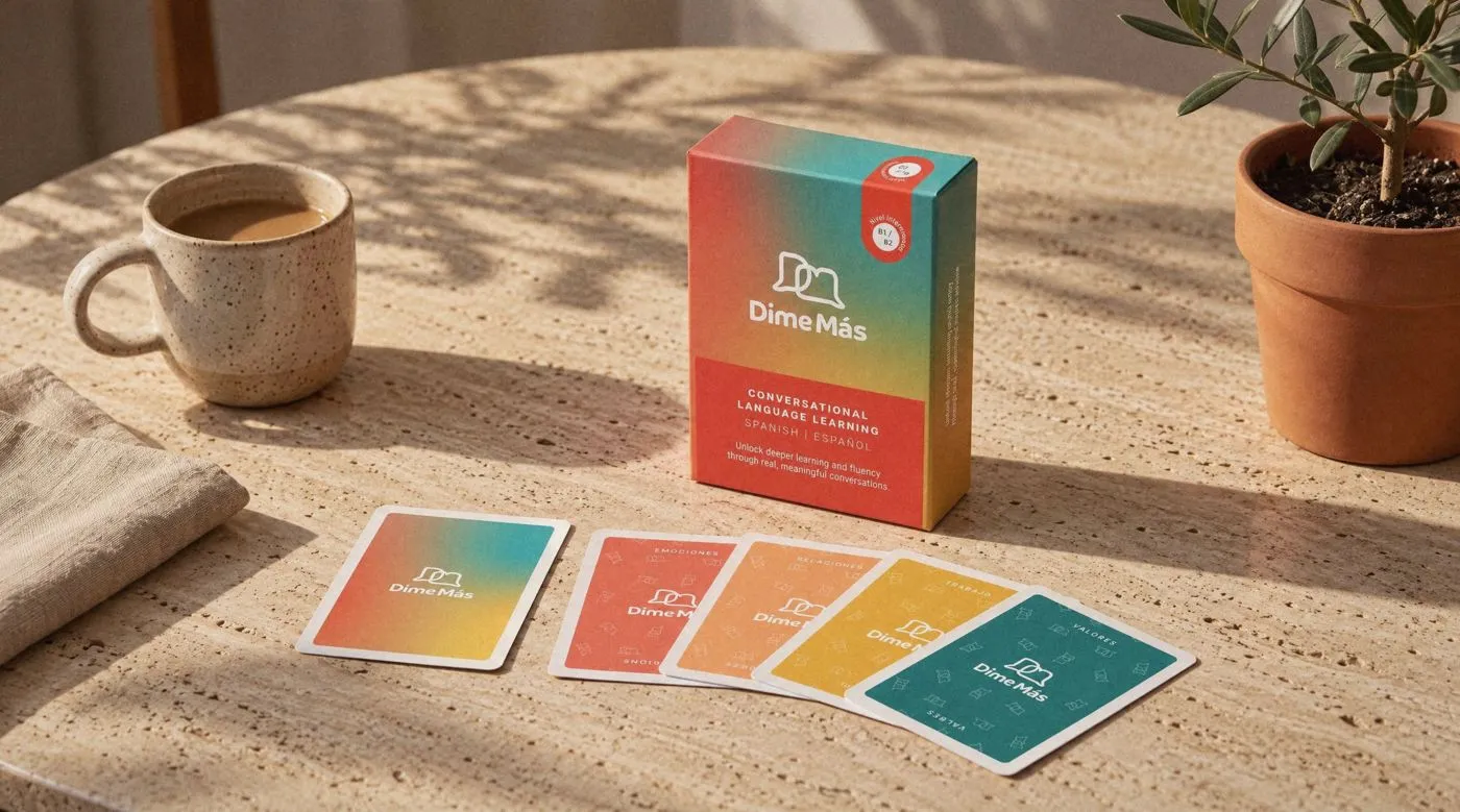 Dime Más Cards intermediate box with cards fanned out on a sunlit table